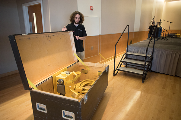 CUB student staff works with AV equipment